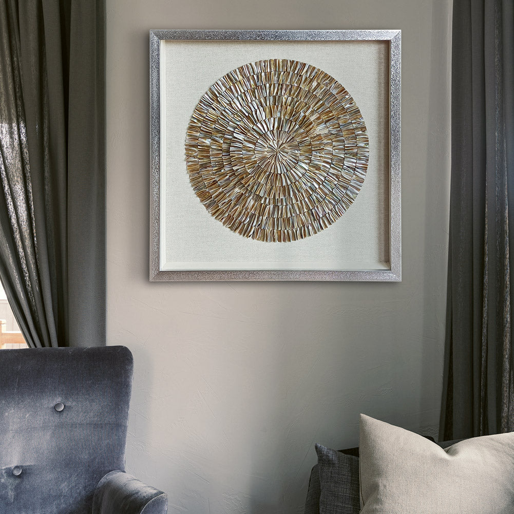 Natural shell radial pattern wall art, warm golden tones on linen mat background